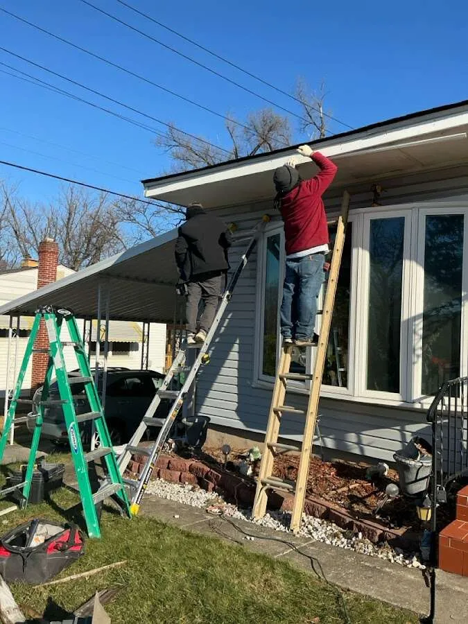 Restoration crew performing exterior repair in Clovis